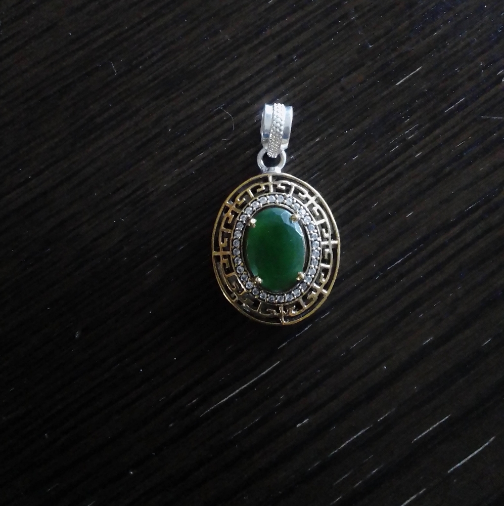 New necklace slide with a dark green center